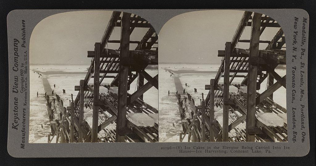 Ice cakes being elevated into an ice house, 1907